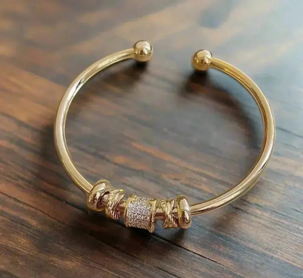 Golden Charm Bracelet with Radiant Stones