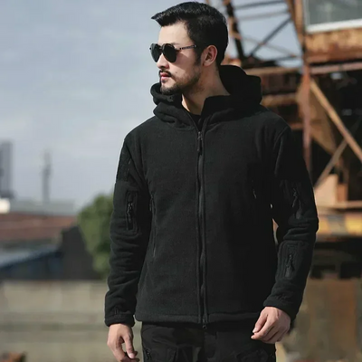 Warm tactical winter fleece jacket for men with adjustable hood and multiple pockets.